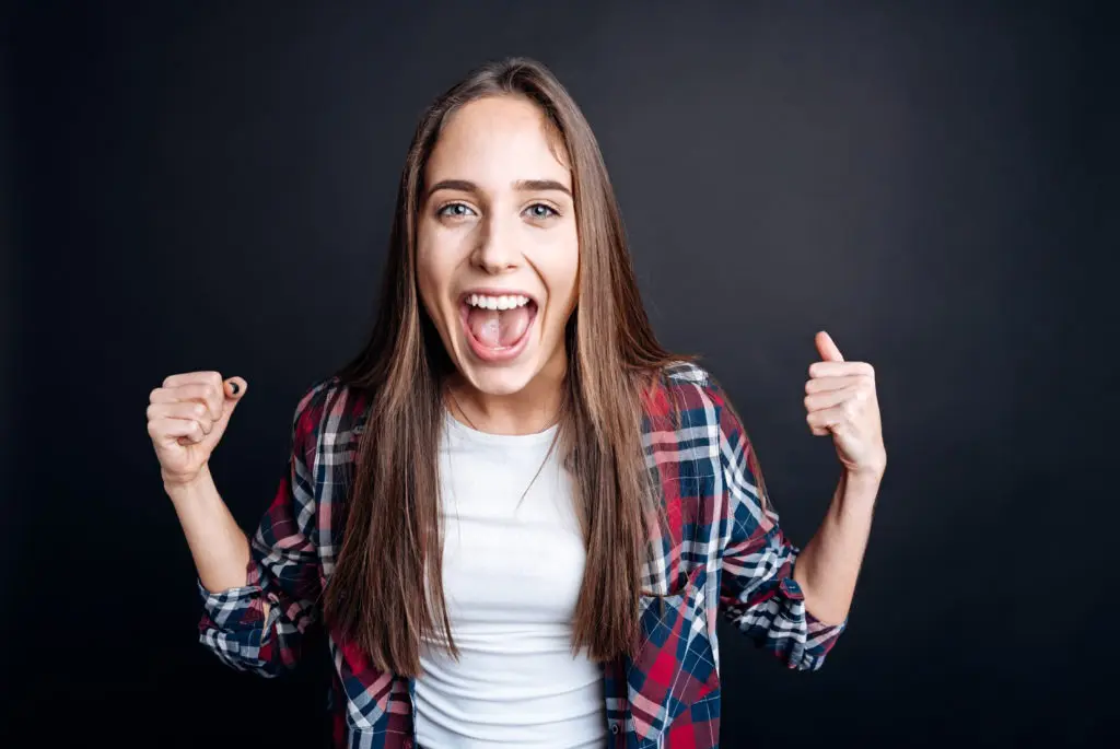Cheerful woman expressing joy Braces Everett WA